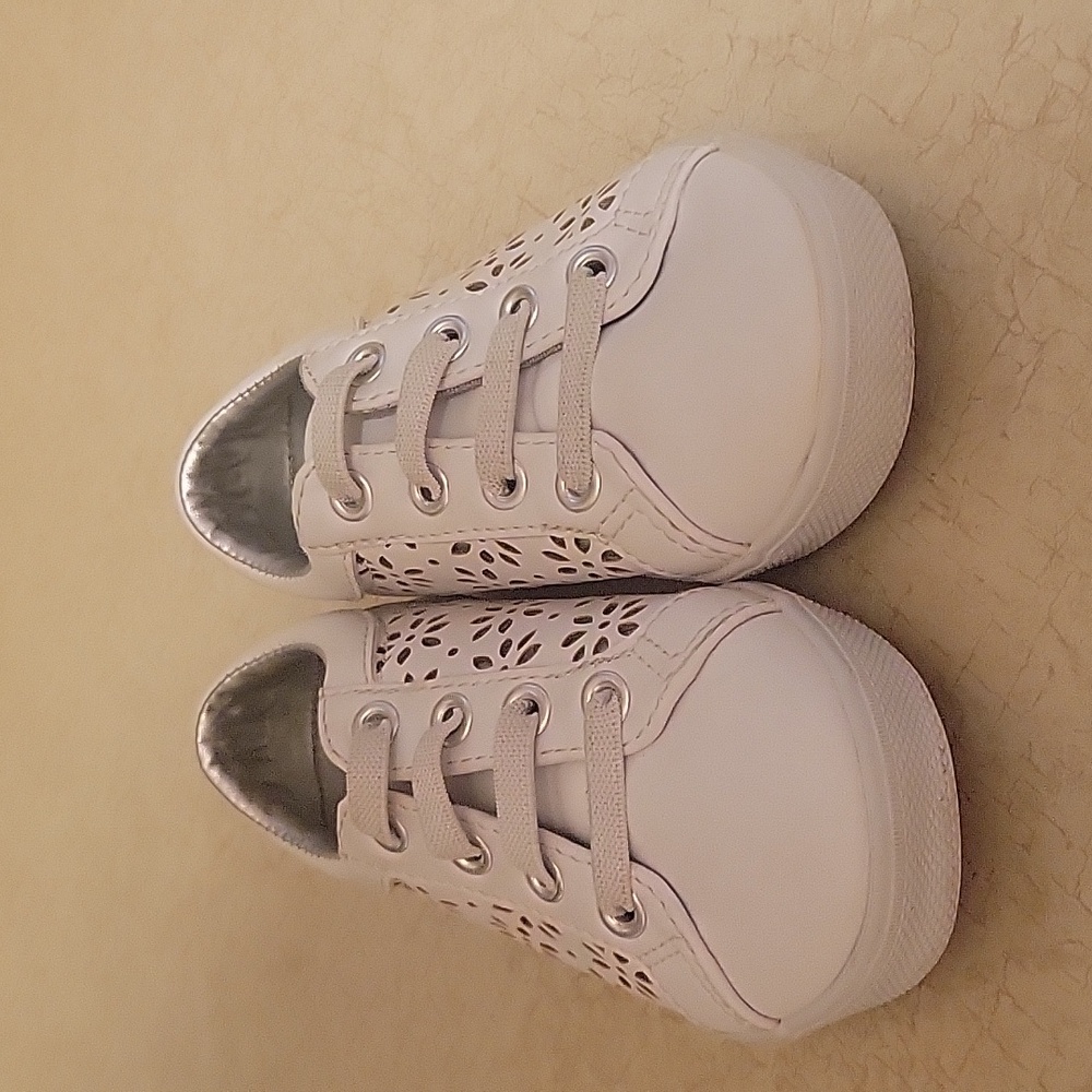 Janie and Jack laser cut flower slip on sneakers.